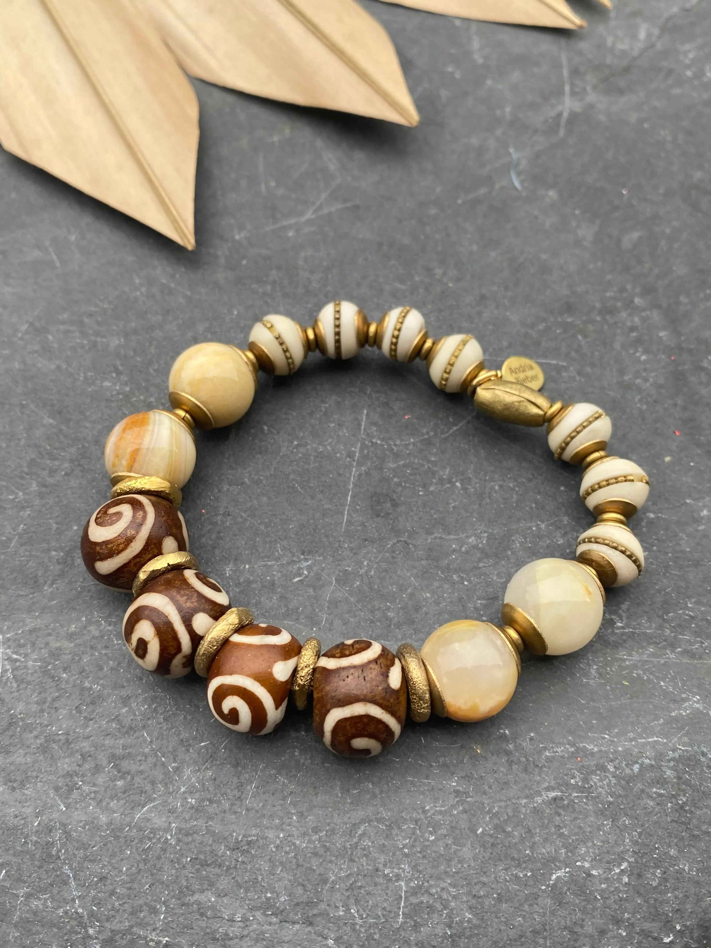 African wood, indoneisan glass, stone, African brass, elastic cording, bracelet, jewelry