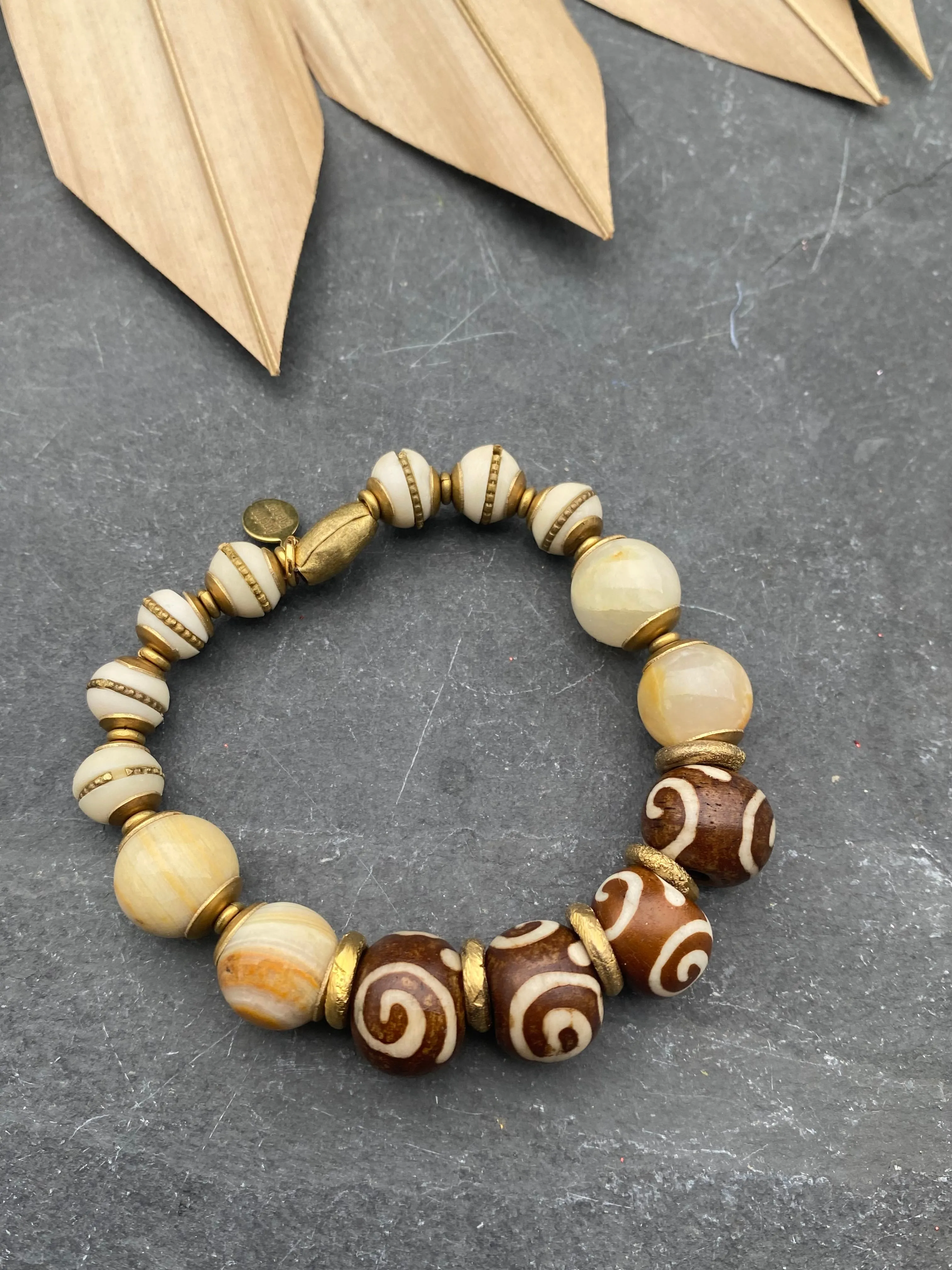 African wood, indoneisan glass, stone, African brass, elastic cording, bracelet, jewelry