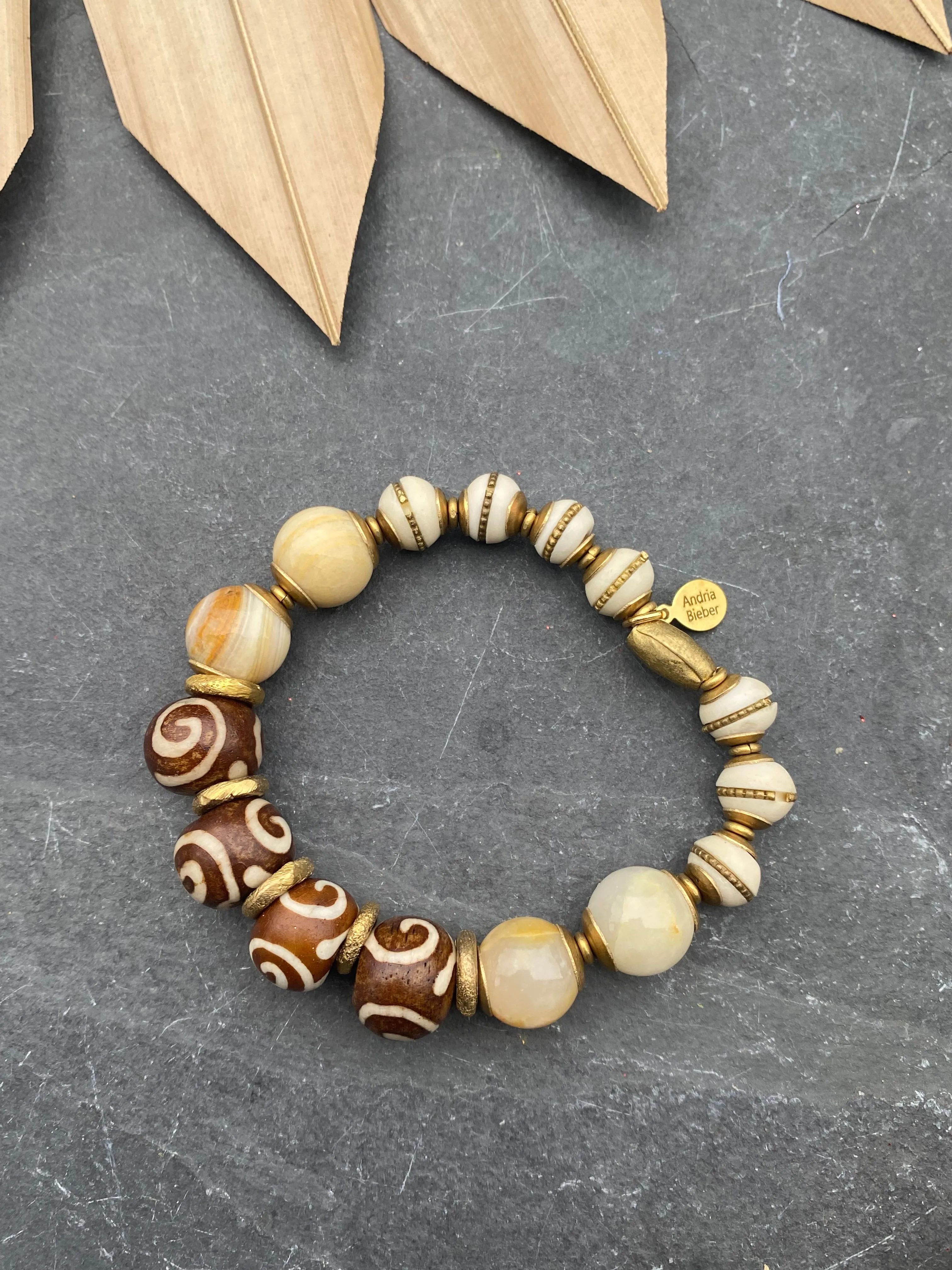 African wood, indoneisan glass, stone, African brass, elastic cording, bracelet, jewelry